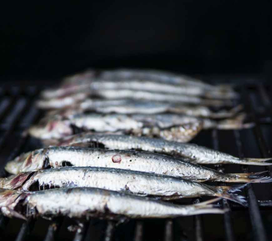 photo of raw fish on grill