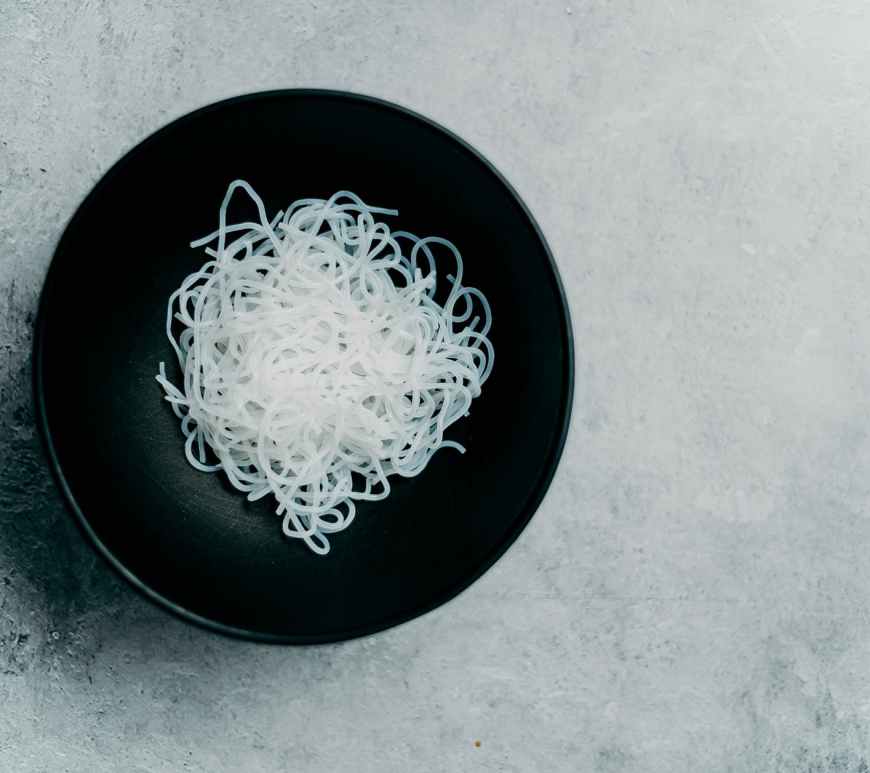 photo of noodles on bowl