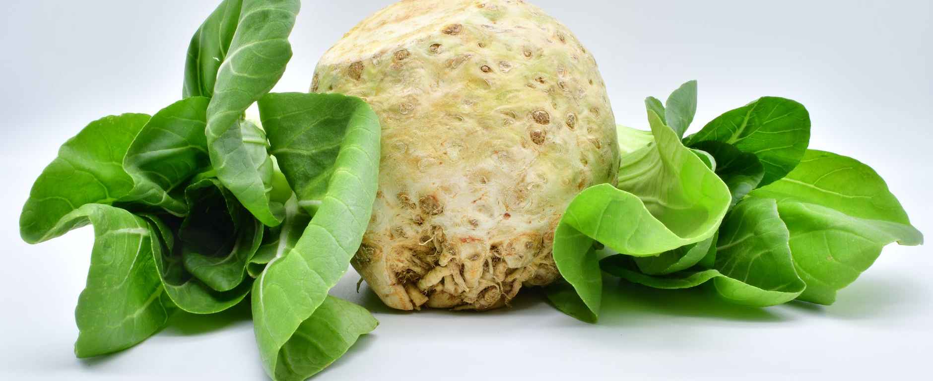 green vegetables on white surface