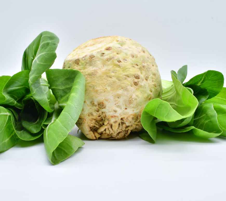 green vegetables on white surface